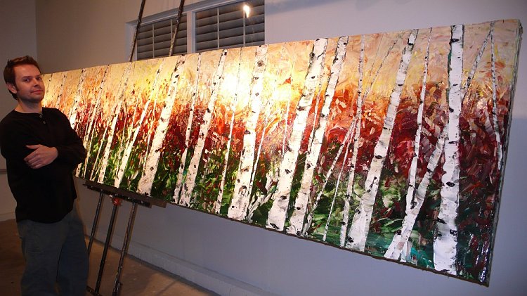 Artist with 3 by 15 foot commission